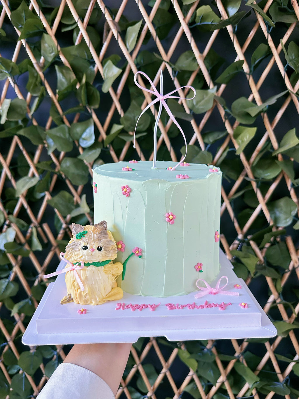 Handmade buttercream kitten cake