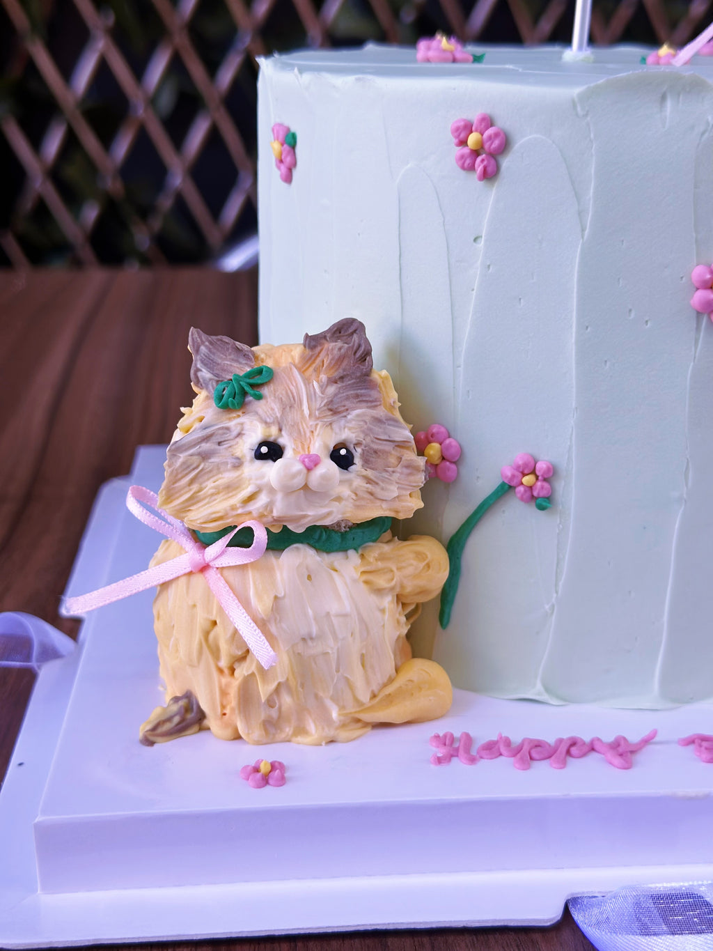 Handmade buttercream kitten cake