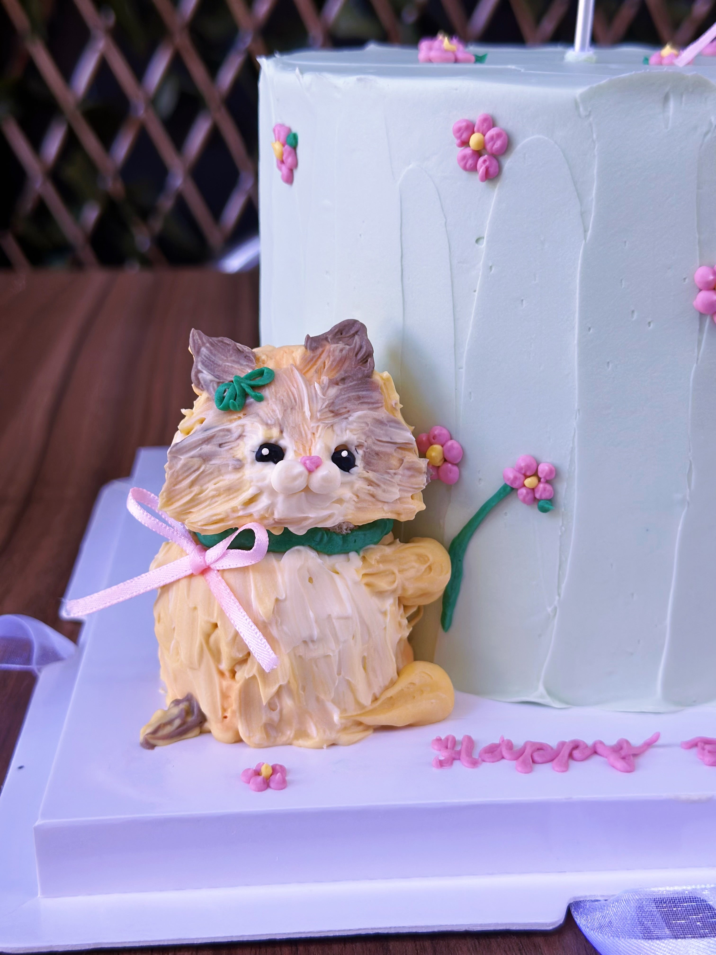 Handmade buttercream kitten cake