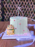 Handmade buttercream kitten cake